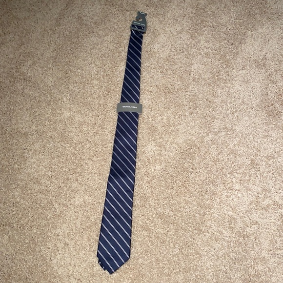 Michael Kors never used tie